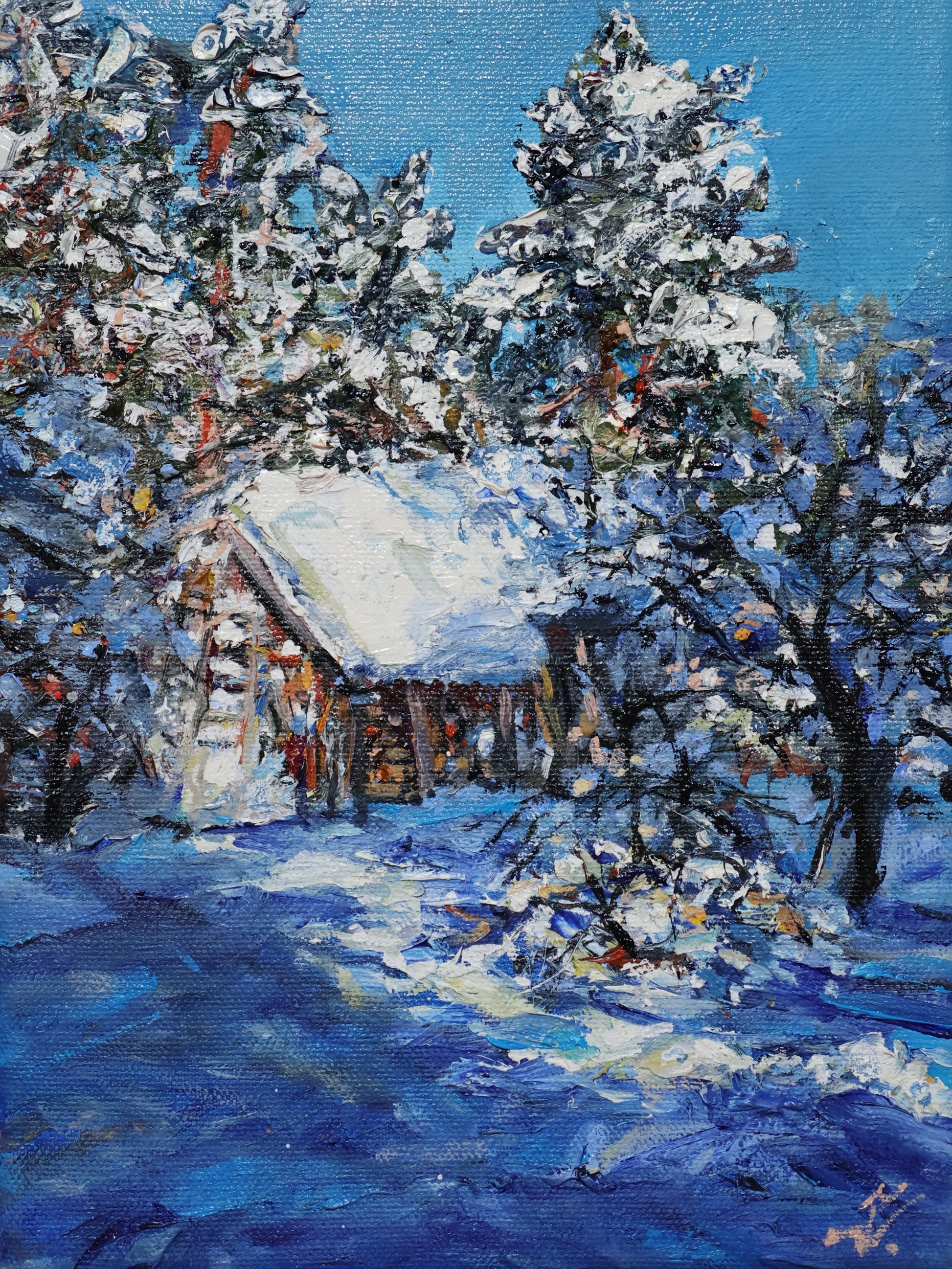 Zita Vevere small painting of a snow covered building surrounded by trees